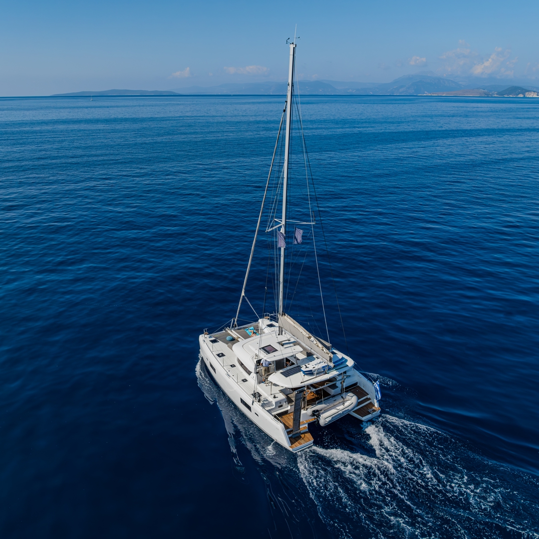 Cruising catamaran towards Meganisi.