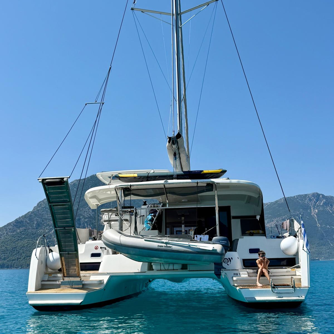 Guests relaxing on anchor on Catamaran JOY.